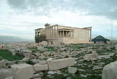 Temple of Athena across rock field.