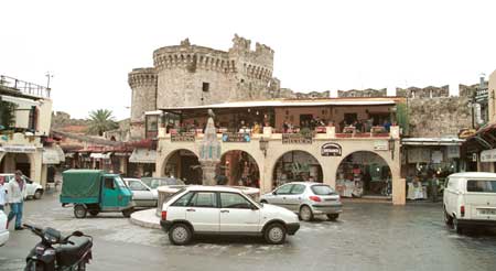 Town center. Notice the cafe built out from the ancient city wall. 