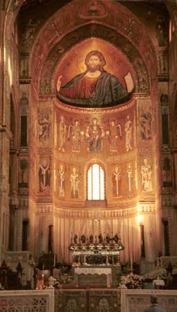 The main altar. There are large silver statues along the back of the altar.