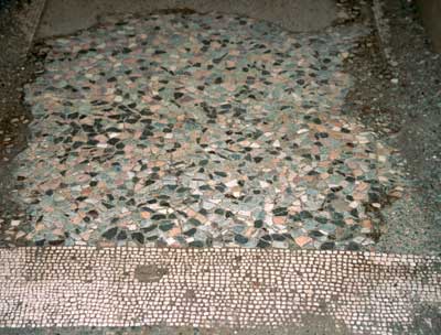 Some floors has a patchwork stone pattern.