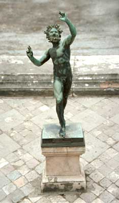 A statue in an atrium pool.